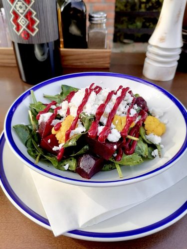 Baby spinach and beetroot with goat cheese