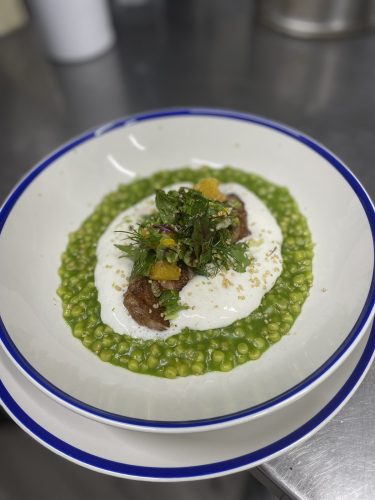 Duck breast with fregula pasta, herbs and parmesan foam